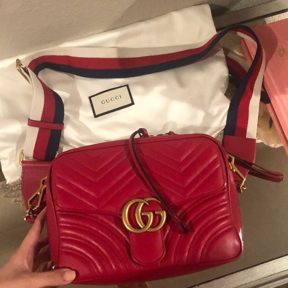 Red Gucci Marmont shoulder bag.